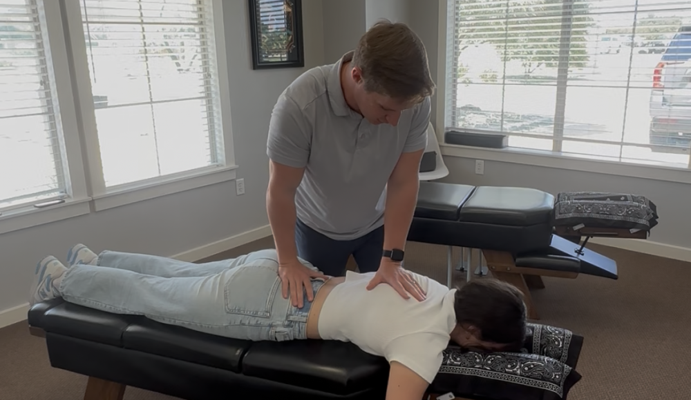 Dr. Cameron Williams performing a chiropractic adjustment on a patient at Radiant Chiropractic